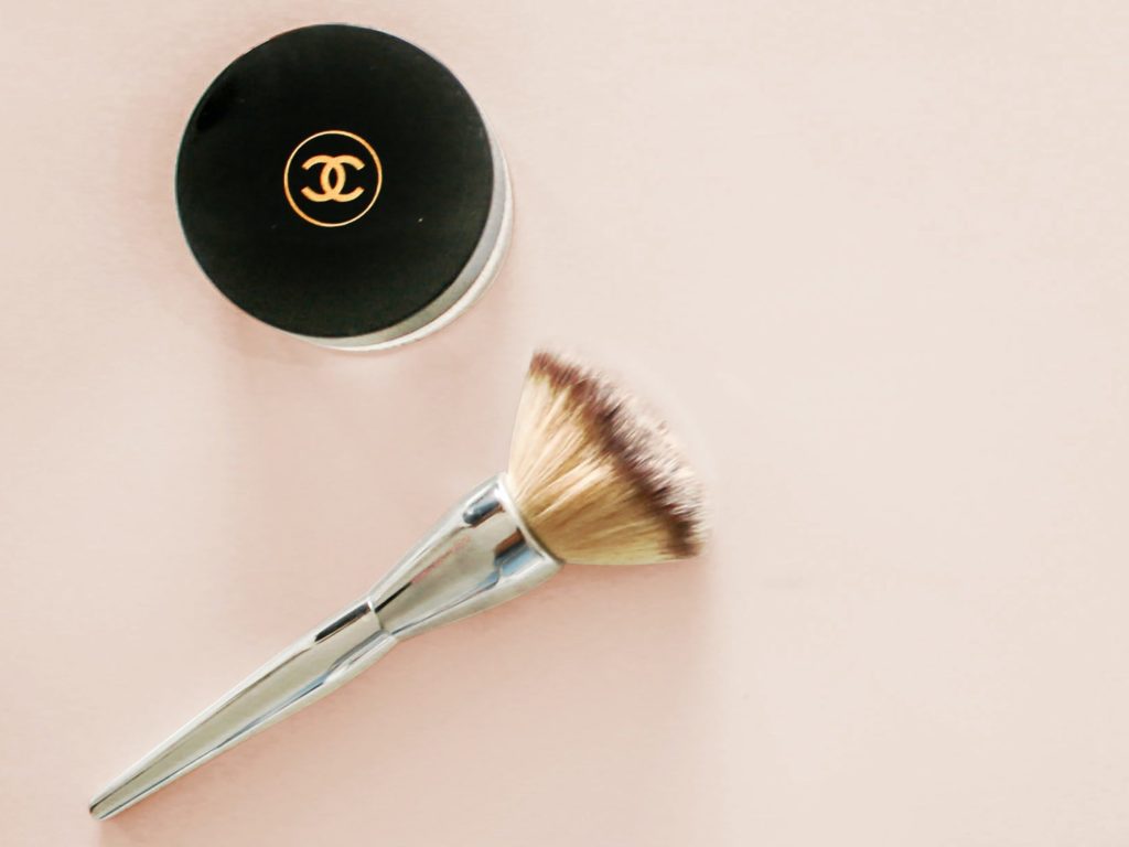 Chanel makeup kit showing iconic locked C's brand logo